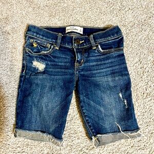 Abercrombie Distressed Denim Shorts. Never worn. Size 10/girls.